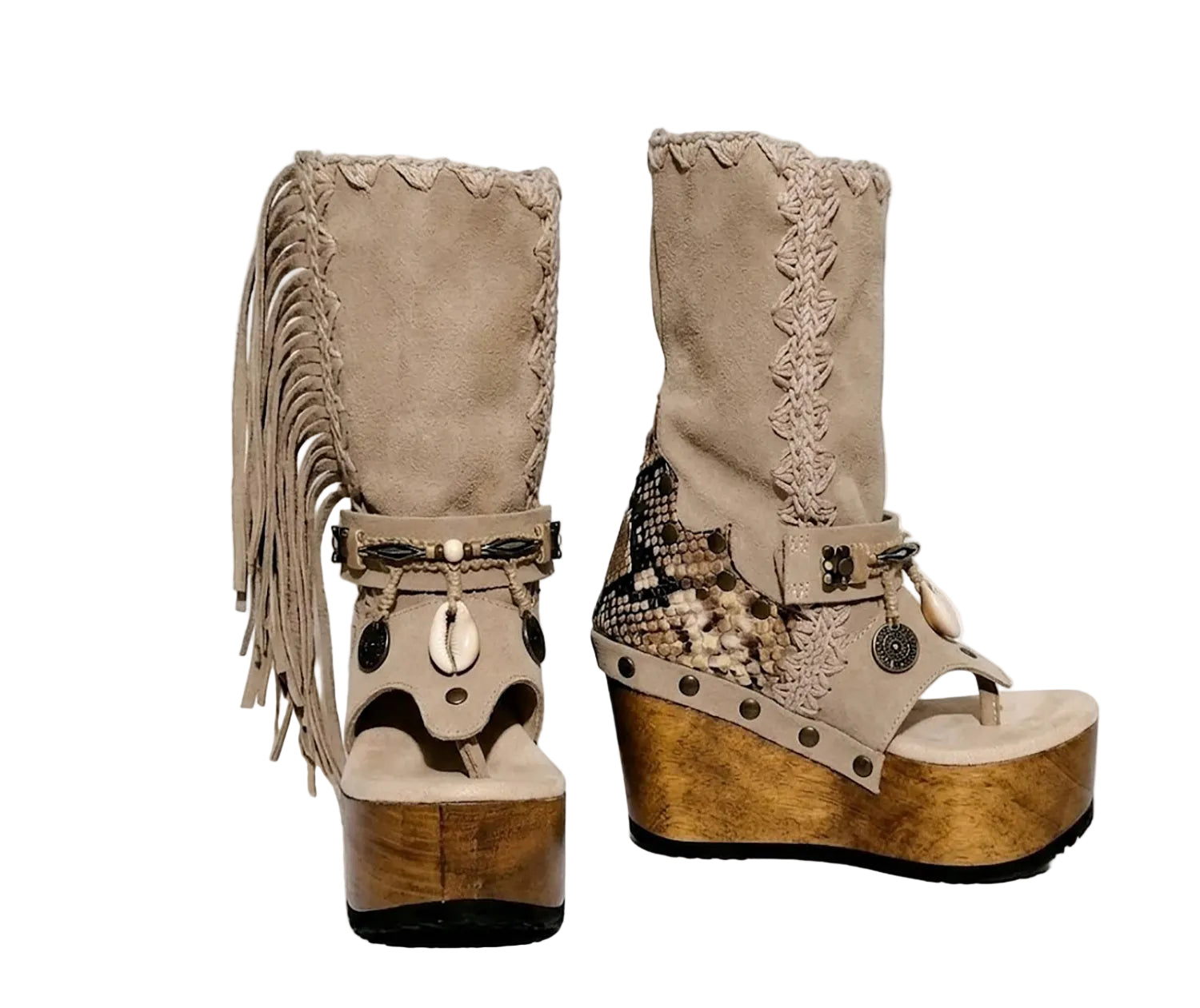 Atenea Flip Flop Boots by Sol Caleyo in neutral beige suede, featuring boho fringes, shell decorations, snake-print heel, and a tall wooden platform sole.