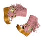Handmade Atenea Pink Flip Flop Boots by Sol Caleyo, featuring pink suede leather, fringe details, shells, vintage coins, and a high wooden platform sole on a white background