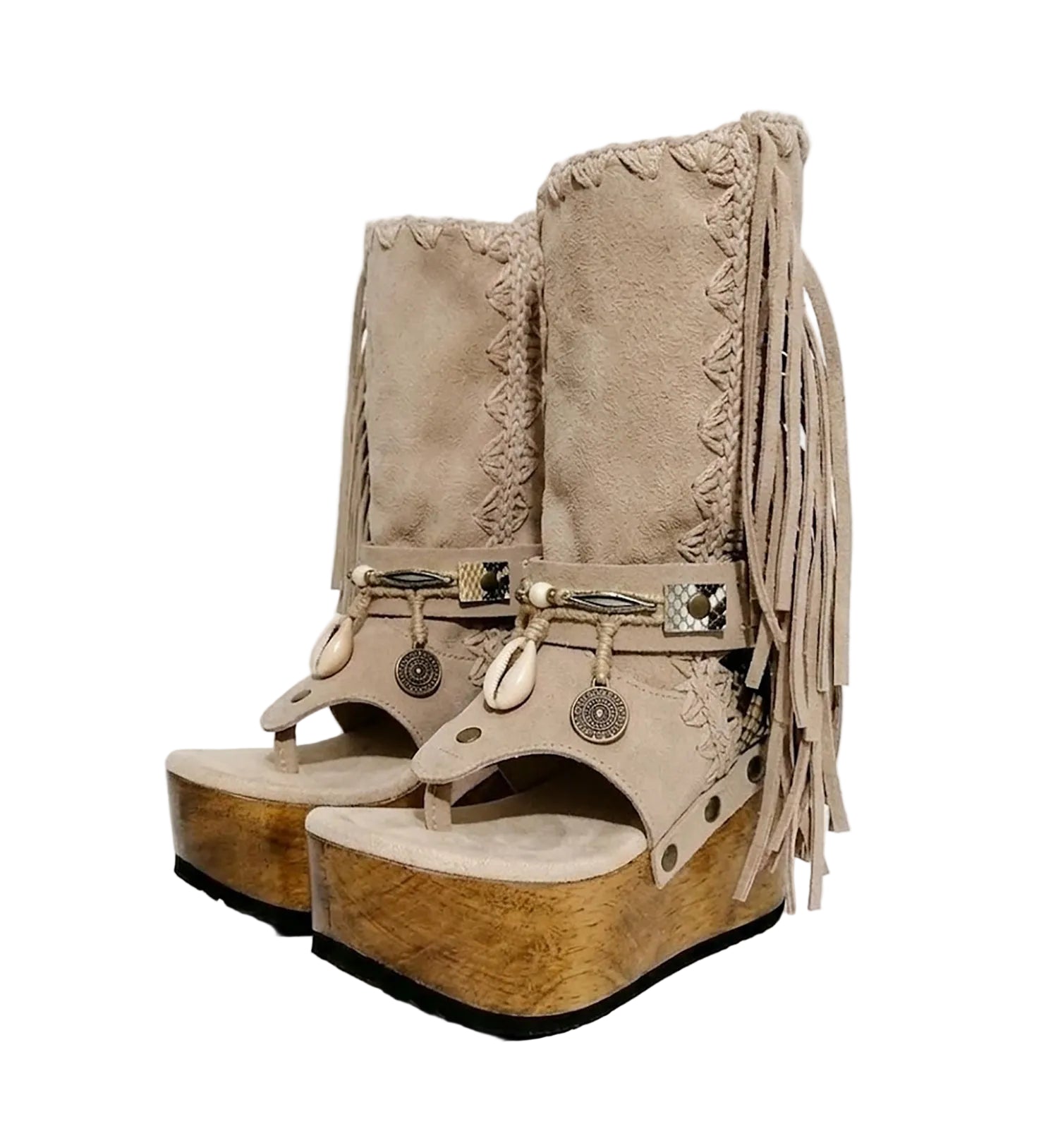 Atenea Flip Flop Boots by Sol Caleyo in neutral beige suede, featuring boho fringes, shell decorations, snake-print heel, and a tall wooden platform sole.