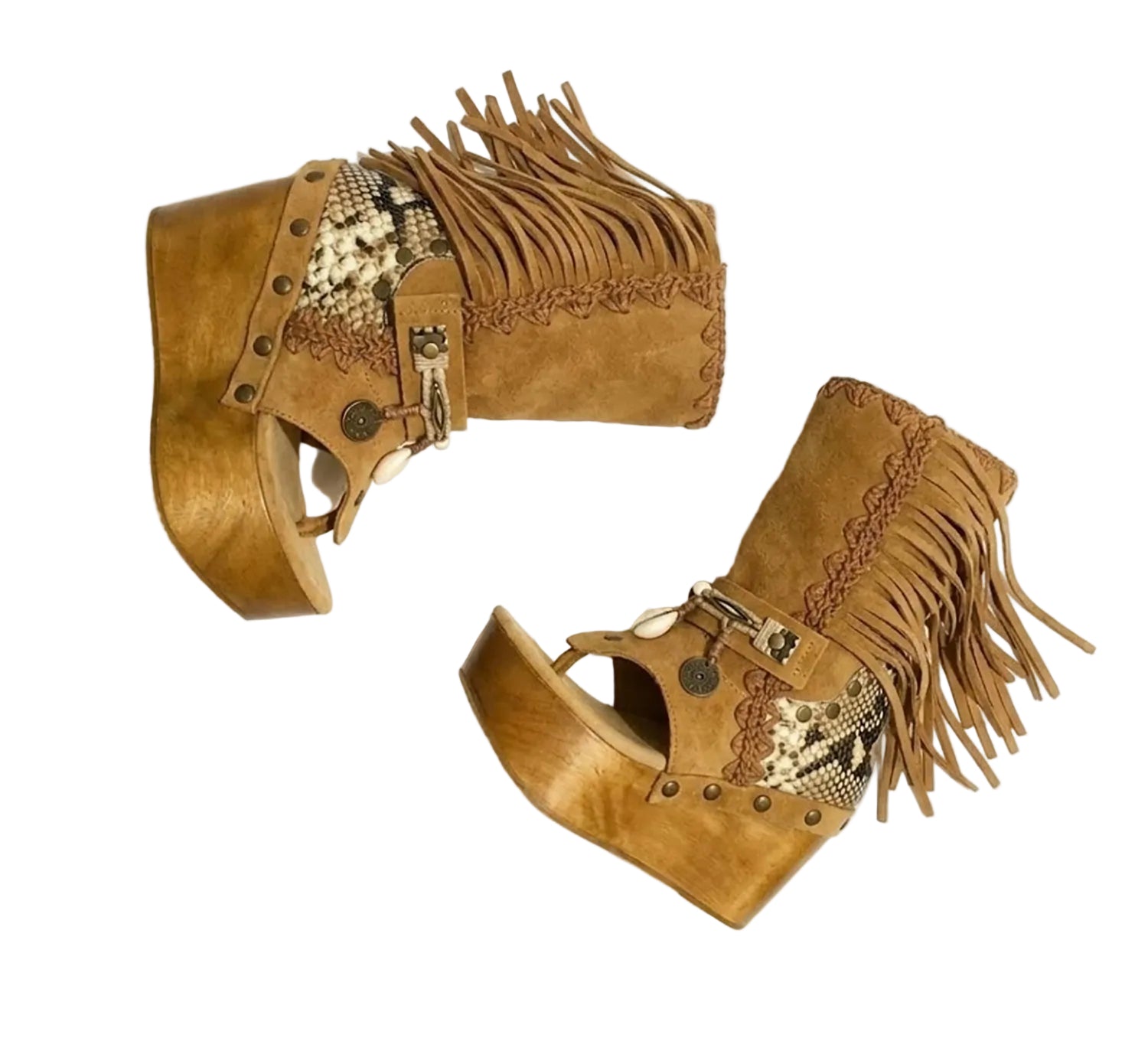 Handmade Atenea Camel Flip Flop Boots by Sol Caleyo, featuring warm camel-colored suede, bohemian fringes, shell embellishments, snake-print details, and a high wooden platform sole on a white background.