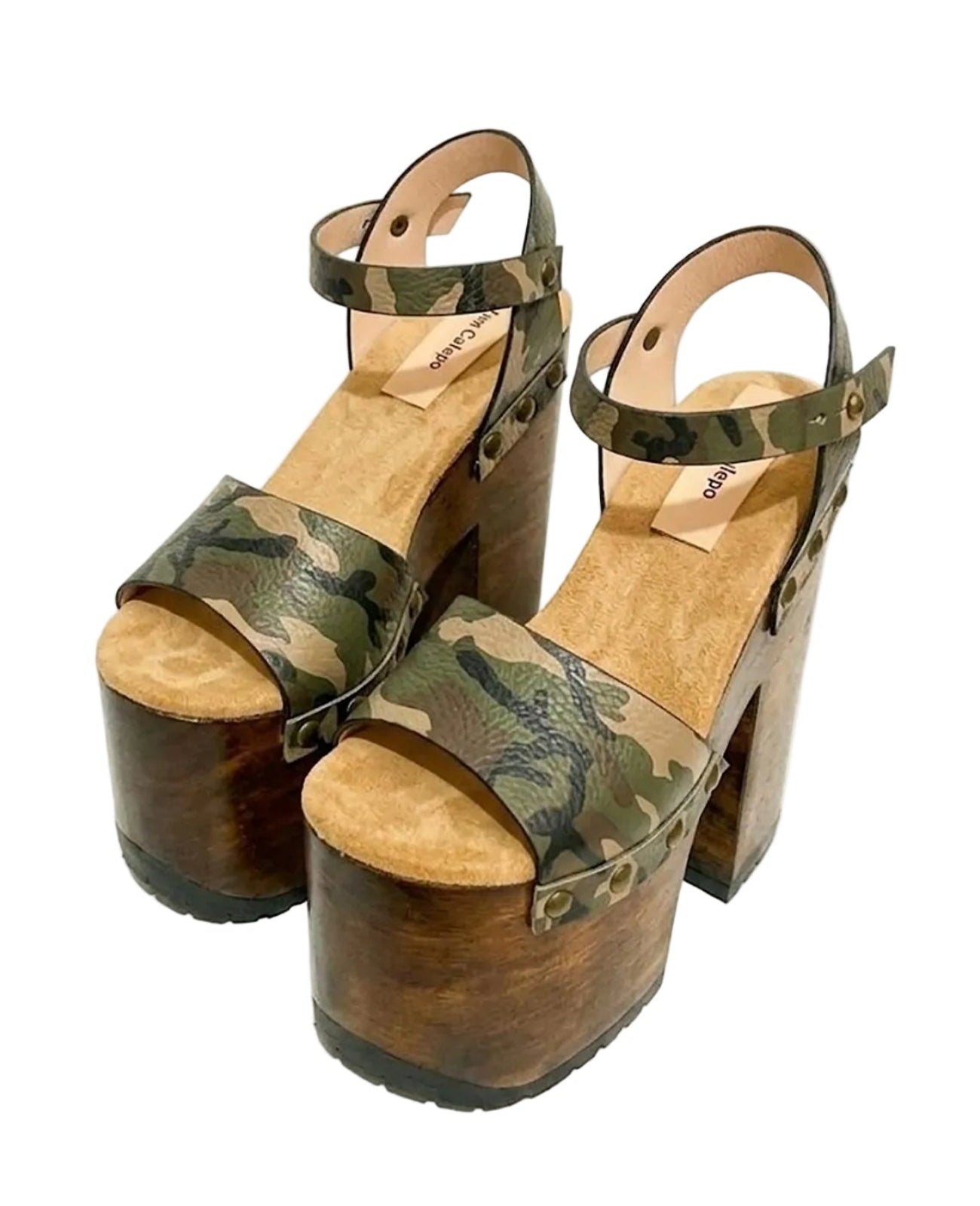 Side view of Crazy Armi Sandals by Sol Caleyo, featuring a 17 cm wooden heel, camouflage leather straps, and brass stud details on a white background.