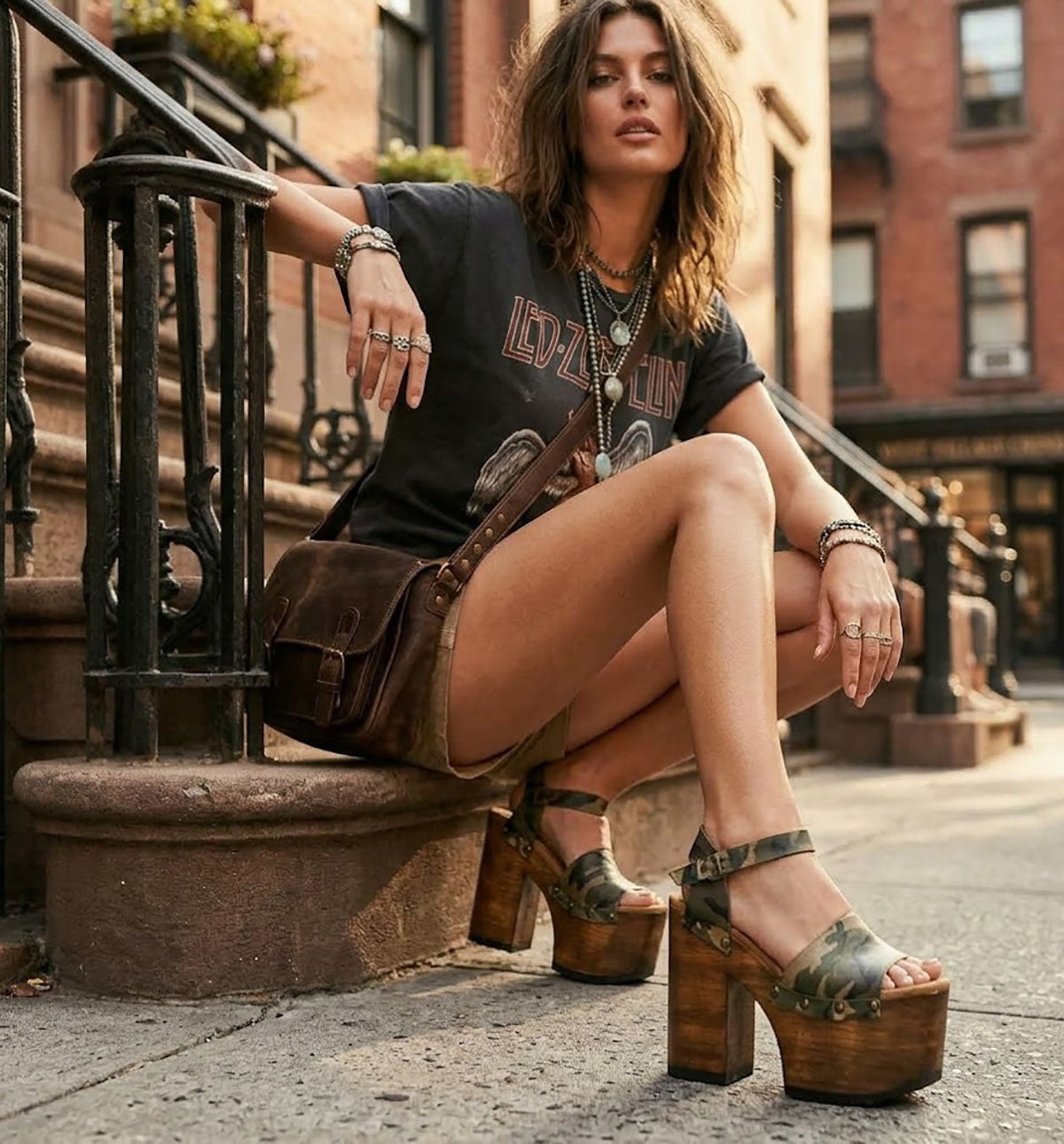 Modern camouflage platform sandals by Sol Caleyo, showcasing the 70s-style high wooden heel and tractor sole for an edgy, military-inspired look.