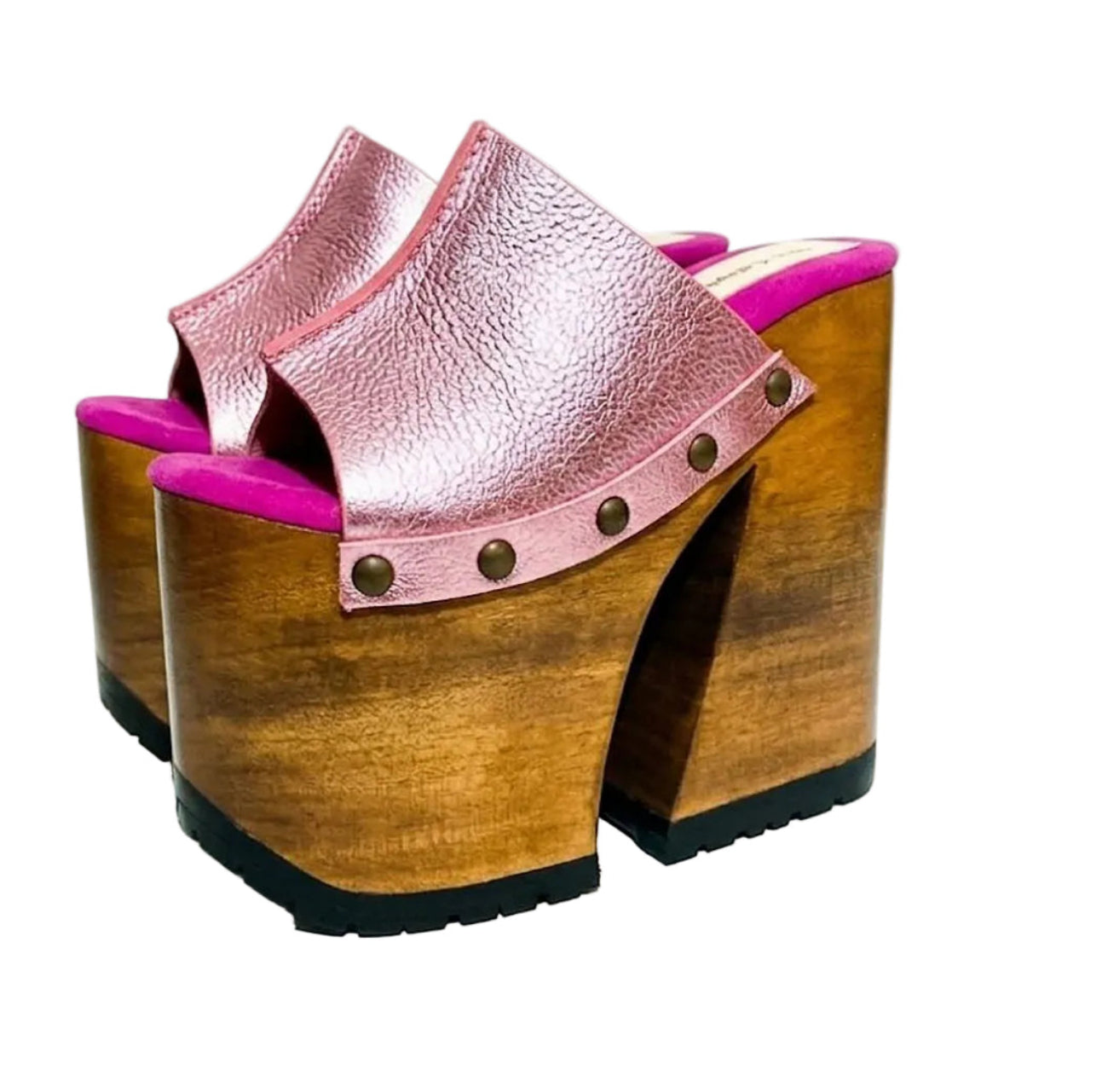 Side view of Sol Caleyo Pink Luxury Queen Sandals featuring metallic pink leather, bronze studs, and a high architectural wooden platform heel against a white background.