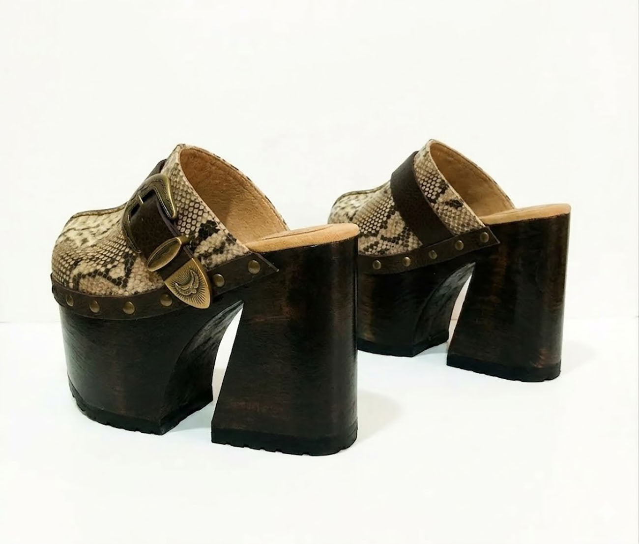 High-angle view of Route 66 XL snake print leather clogs featuring an extreme 17cm wooden heel and 11cm platform.
