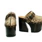High-angle view of Route 66 XL snake print leather clogs featuring an extreme 17cm wooden heel and 11cm platform.