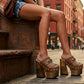 Fashion model sitting on urban brownstone steps wearing Light Brown Indian Clogs XL with denim shorts and a white tank top, showcasing the extreme wooden platform height.