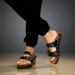 Handmade men’s black leather Birk sandals with wooden sole and black Vibram outsole by Sol Caleyo.