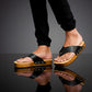 Black leather handcrafted men’s sandals with flat wooden sole and comfortable open clog design.