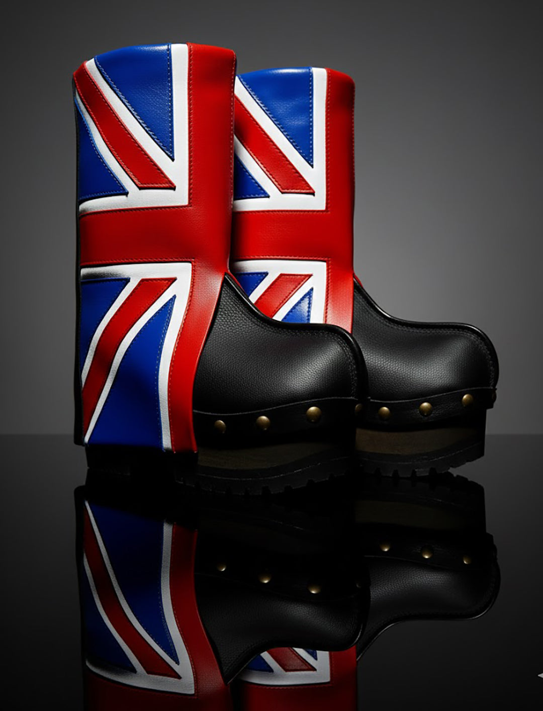 Handmade leather clog boots with England flag design and wooden platform sole by Sol Caleyo.