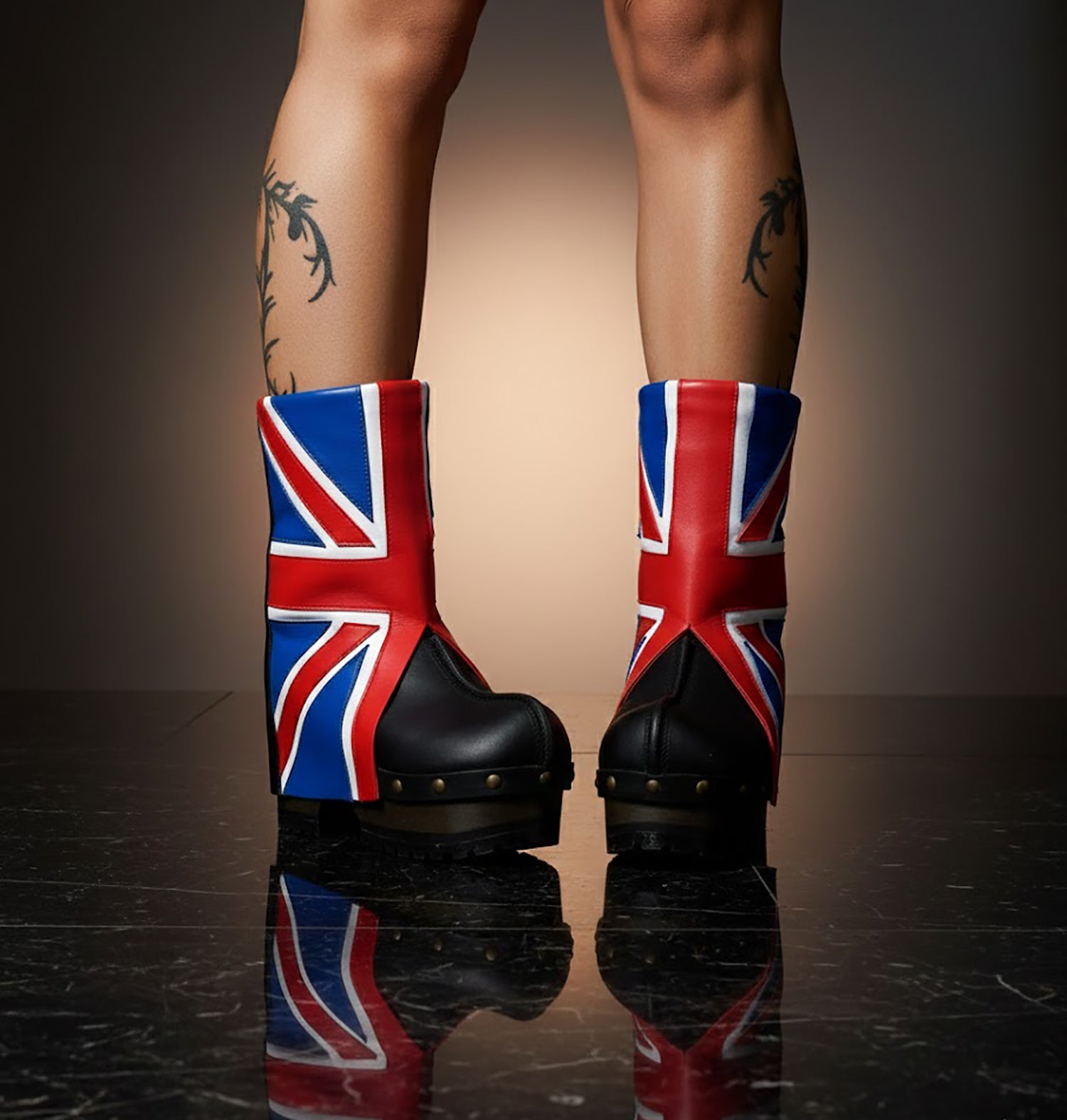 Handmade leather clog boots with England flag design and wooden platform sole by Sol Caleyo.