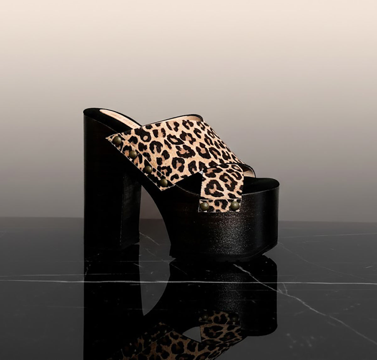 Leopard leather clogs with platform and super high heel. Leather mule with super high wooden heel. Vintage 70's style leather clogs. Vintage style super high heel sandal. Sizes 34 to 47. High quality leather shoes handmade by sol Caleyo. Sustainable fashion.