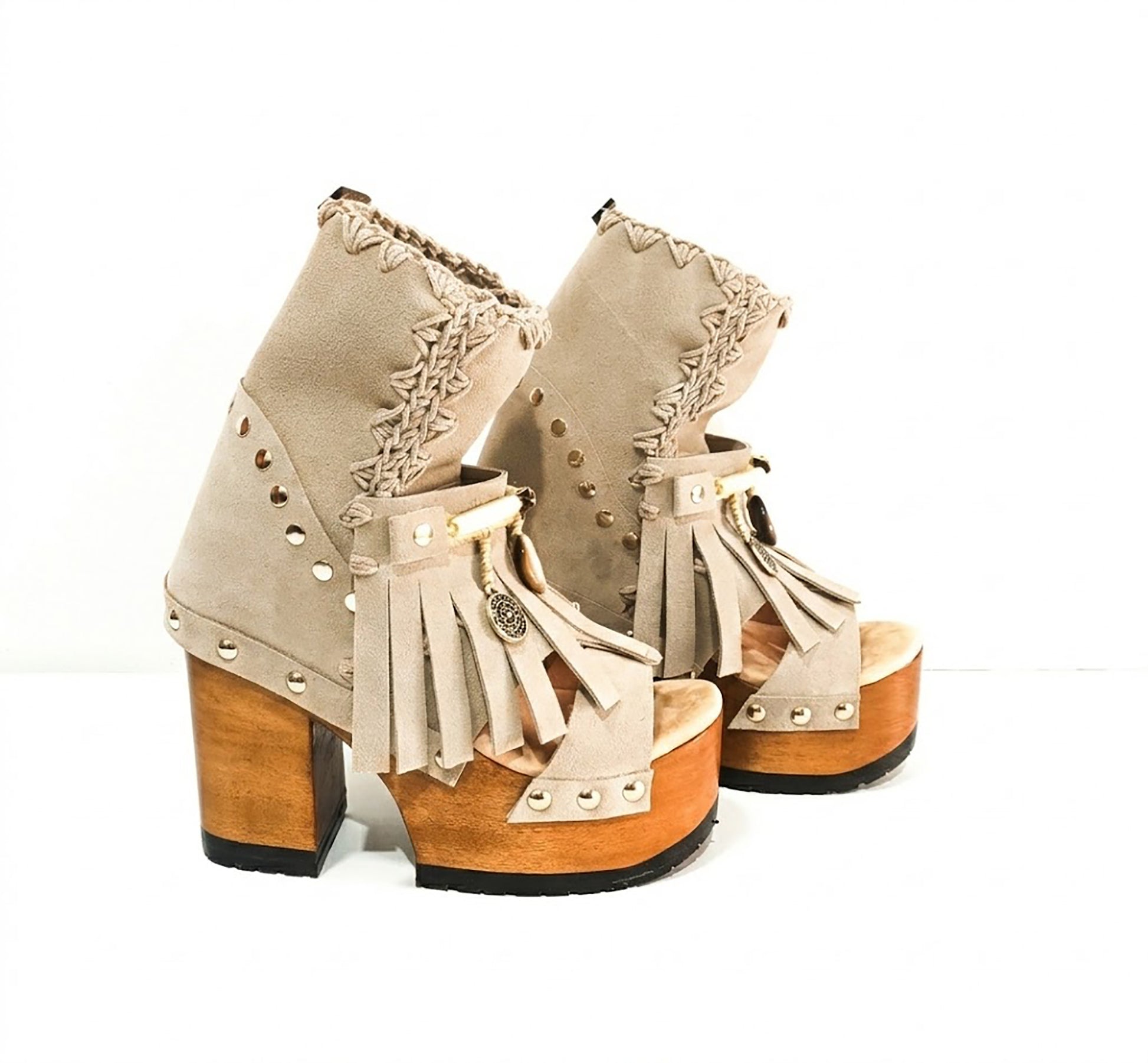 Bohemian style Beige suede leather boots. Turquoise boots with wooden heel. Turquoise boots decorated with coins, horns and feathers, Boho Chic style. High-end handmade footwear by Sol Caleyo.