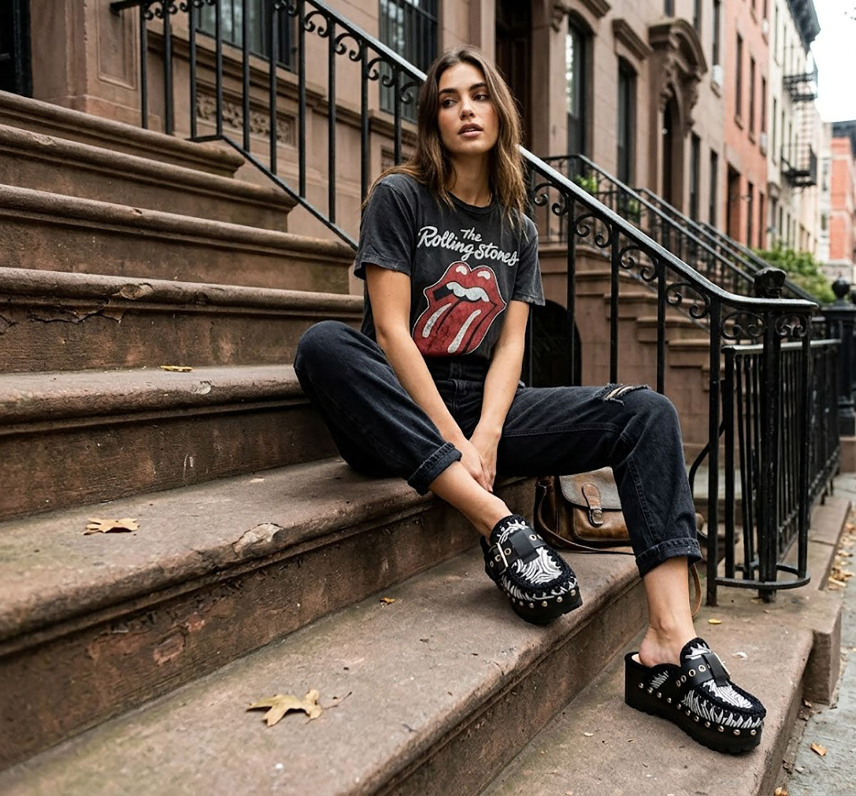 Model wearing Sol Caleyo Zebra Oxford Clogs with a 6 cm heel and 5 cm platform, showcasing the zebra-patterned leather and sophisticated bohemian style.