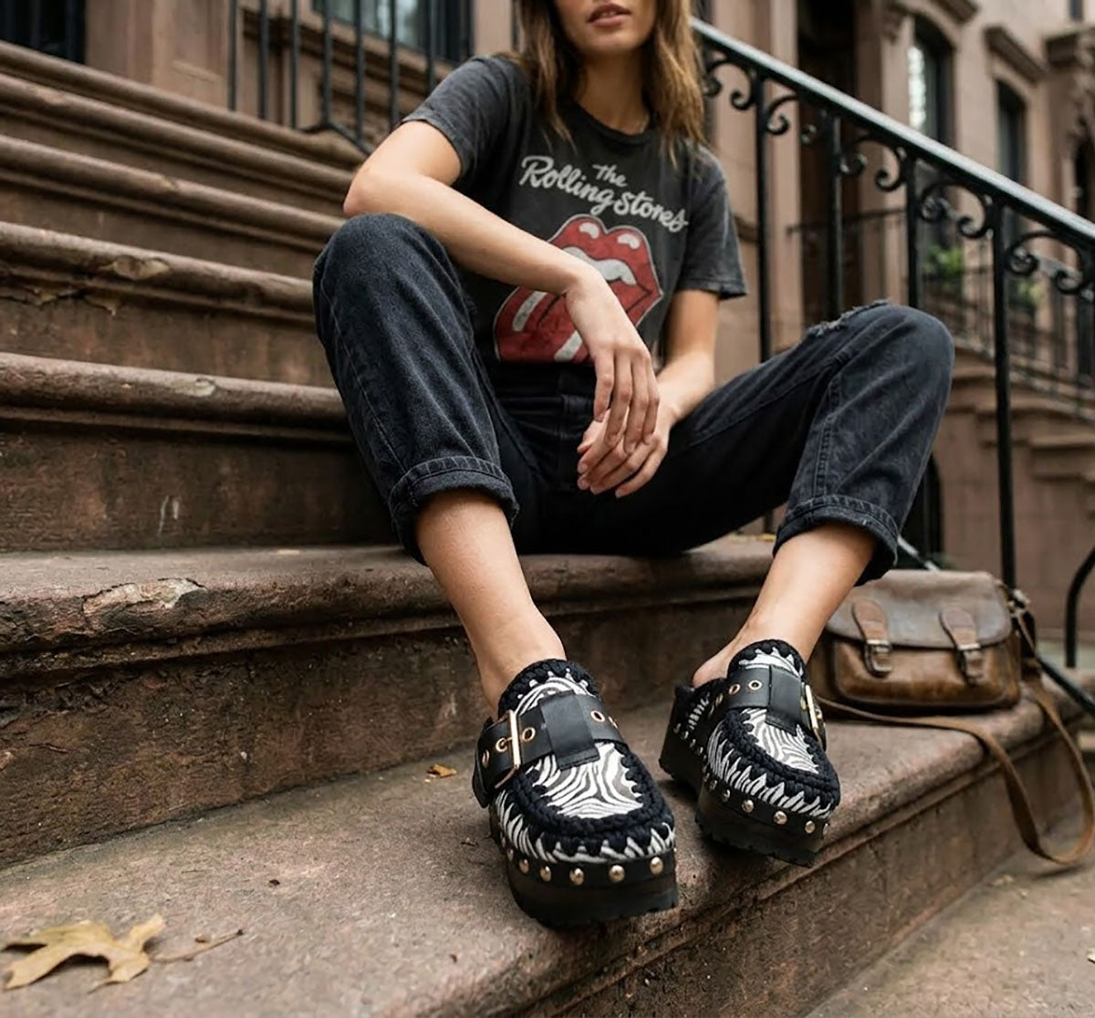 Model wearing Sol Caleyo Zebra Oxford Clogs with a 6 cm heel and 5 cm platform, showcasing the zebra-patterned leather and sophisticated bohemian style.