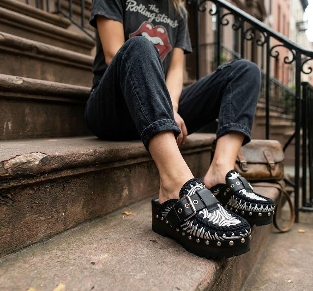 Model wearing Sol Caleyo Zebra Oxford Clogs with a 6 cm heel and 5 cm platform, showcasing the zebra-patterned leather and sophisticated bohemian style.