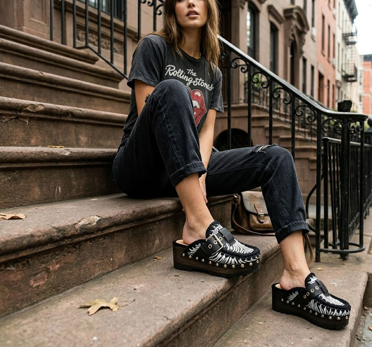 Model wearing Sol Caleyo Zebra Oxford Clogs with a 6 cm heel and 5 cm platform, showcasing the zebra-patterned leather and sophisticated bohemian style.