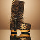 Sol Caleyo Tiger Boots - Handcrafted tiger-print suede boots with 3.5-inch wooden platform and antique gold buckle.