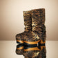 Sol Caleyo Tiger Boots - Handcrafted tiger-print suede boots with 3.5-inch wooden platform and antique gold buckle.