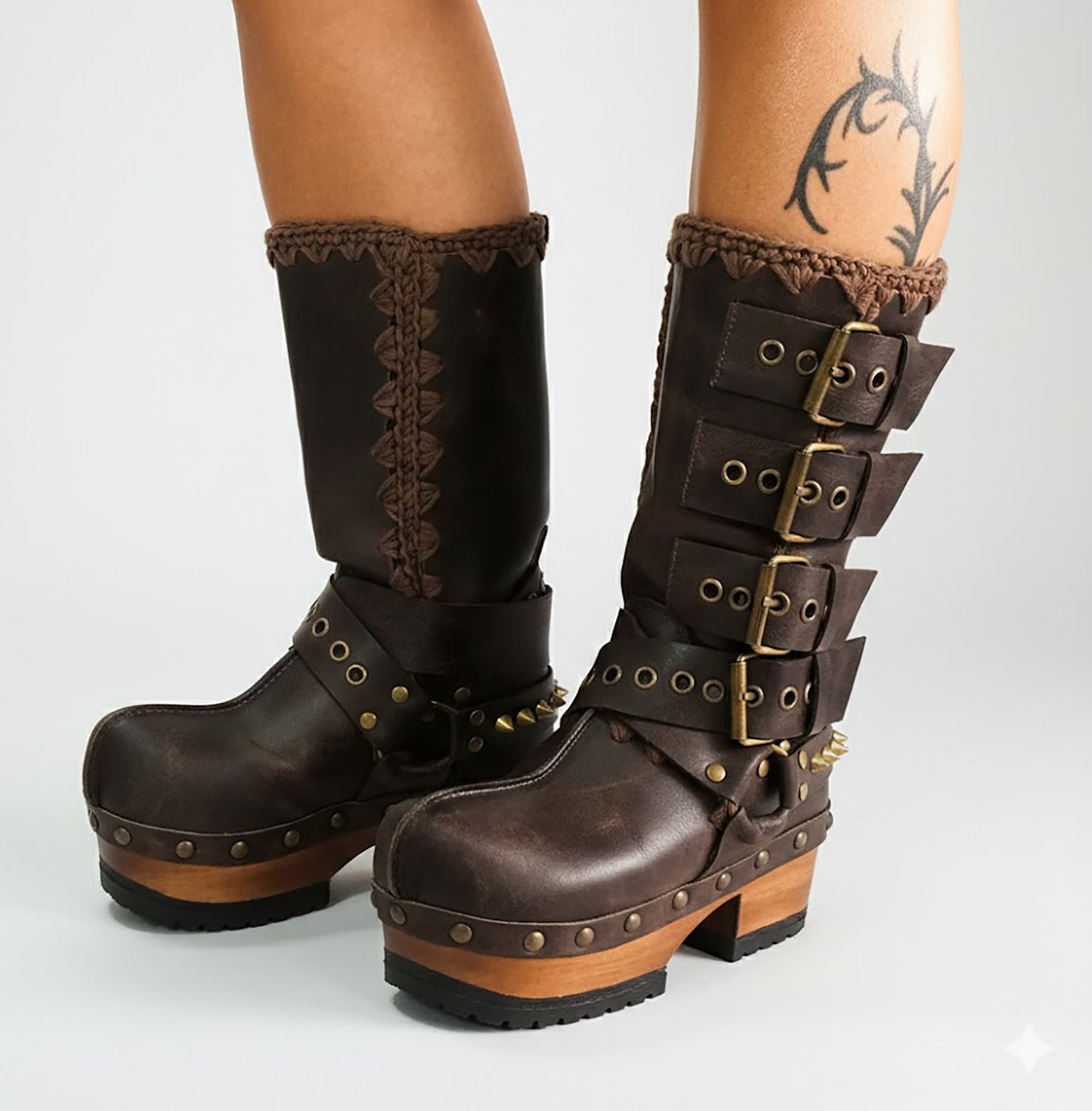 Handmade leather clogs. Dark brown leather biker boots. Leather boots with wooden heels. Leather boots with buckles. High-end footwear handmade by Sol Caleyo.