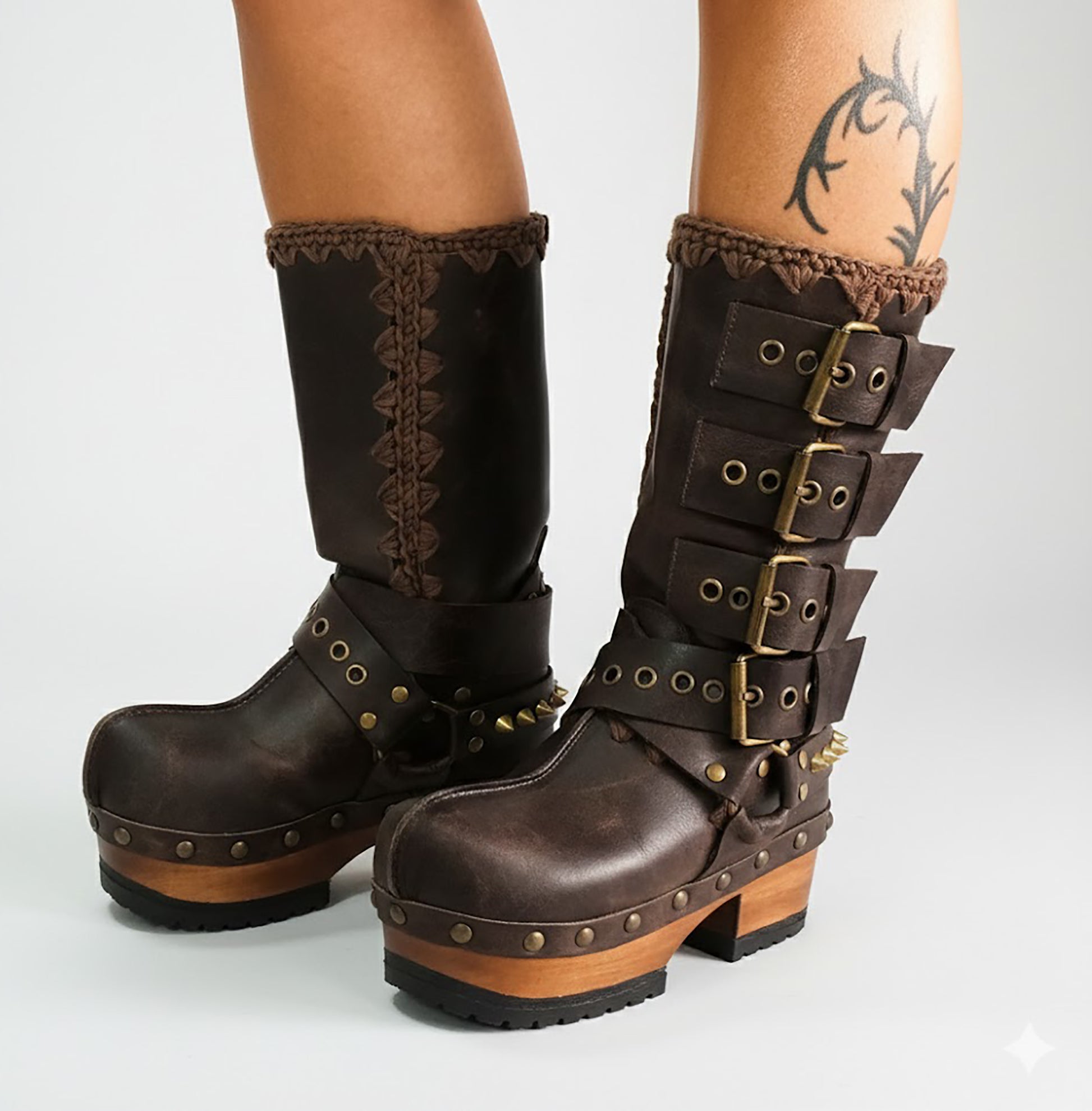 Handmade leather clogs. Dark brown leather biker boots. Leather boots with wooden heels. Leather boots with buckles. High-end footwear handmade by Sol Caleyo.