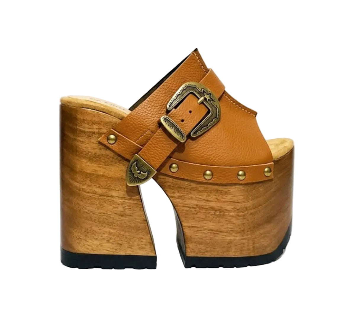 Sol Caleyo handmade Western platform clogs in premium camel leather with 17cm wooden heel and antique-brass concho buckle details.