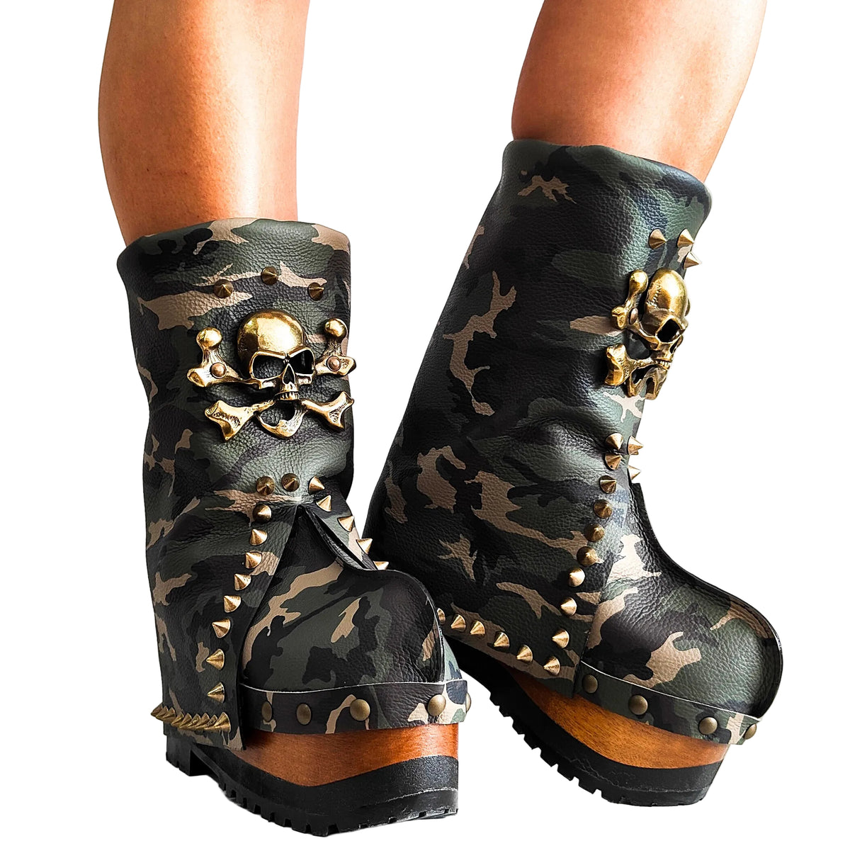 Handmade military green and brown camo print leather mid-calf wedge boots with old-gold metal skull, pyramid studs and 8 cm natural lacquered wooden wedge by Sol Caleyo.