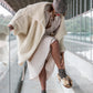Handmade boho suede platform clogs with rabbit fur, carved bone, shells and feathers by Sol Caleyo