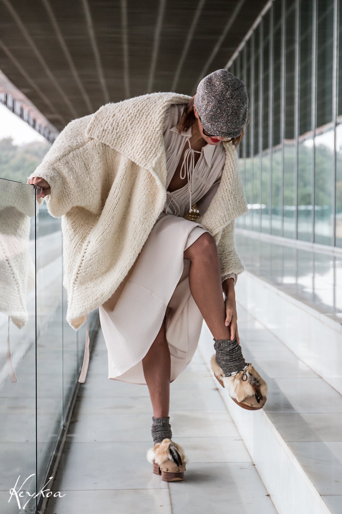 Handmade boho suede platform clogs with rabbit fur, carved bone, shells and feathers by Sol Caleyo