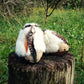 Feathers, shells, bone and carved horn on boho platform clogs.