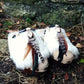 Off-white rabbit fur panel on beige suede mule clogs.