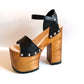 Vintage style platform sandals with super high wooden heels, made in leather. Sizes 34 to 47. Super high wooden heels inspired by the 70s. Exclusive handmade design. High quality footwear handmade by sol Caleyo.