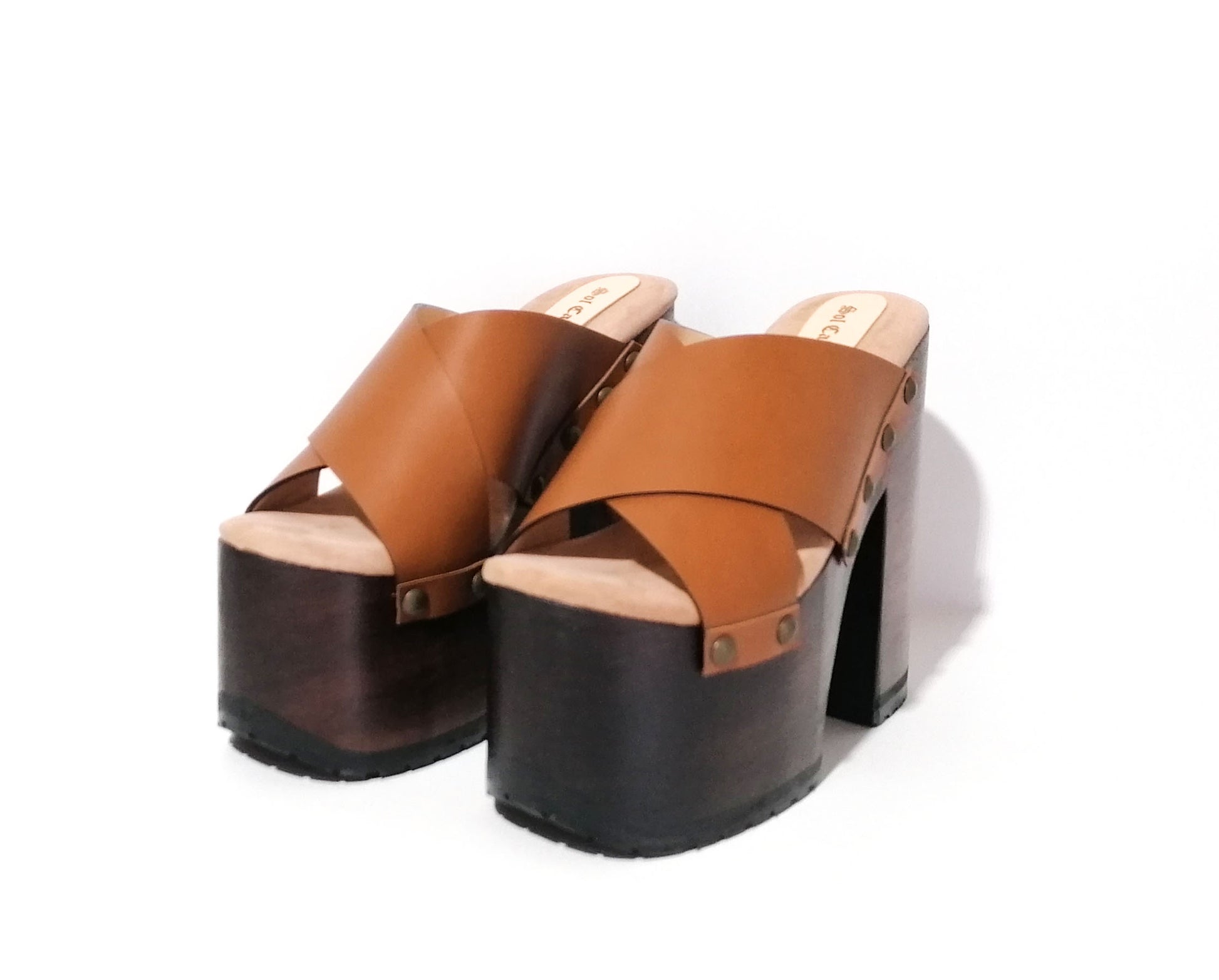 Brown leather clogs with platform and super high heel. Leather mule with super high wooden heel. Vintage 70's style leather clogs. Vintage style super high heel sandal. Sizes 34 to 47. High quality leather shoes handmade by sol Caleyo. Sustainable fashion.