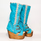 Turquoise wooden wedge boot. Bohemian style boot decorated with shells and coins. Wooden wedge boot. Wooden wedge sandal. Sizes 34 to 47. High quality handmade leather shoes by sol Caleyo. Sustainable fashion.