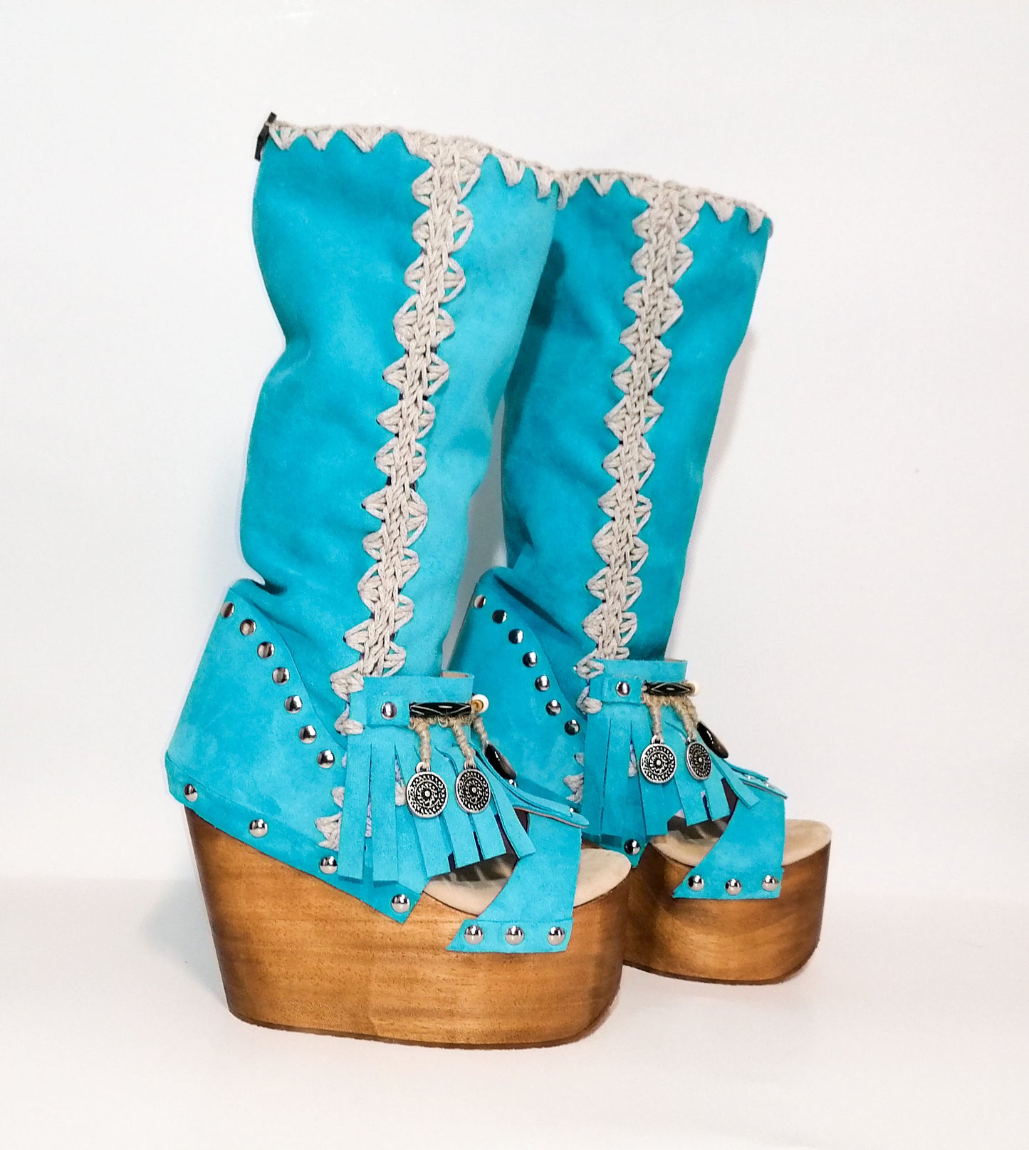 Turquoise wooden wedge boot. Bohemian style boot decorated with shells and coins. Wooden wedge boot. Wooden wedge sandal. Sizes 34 to 47. High quality handmade leather shoes by sol Caleyo. Sustainable fashion.