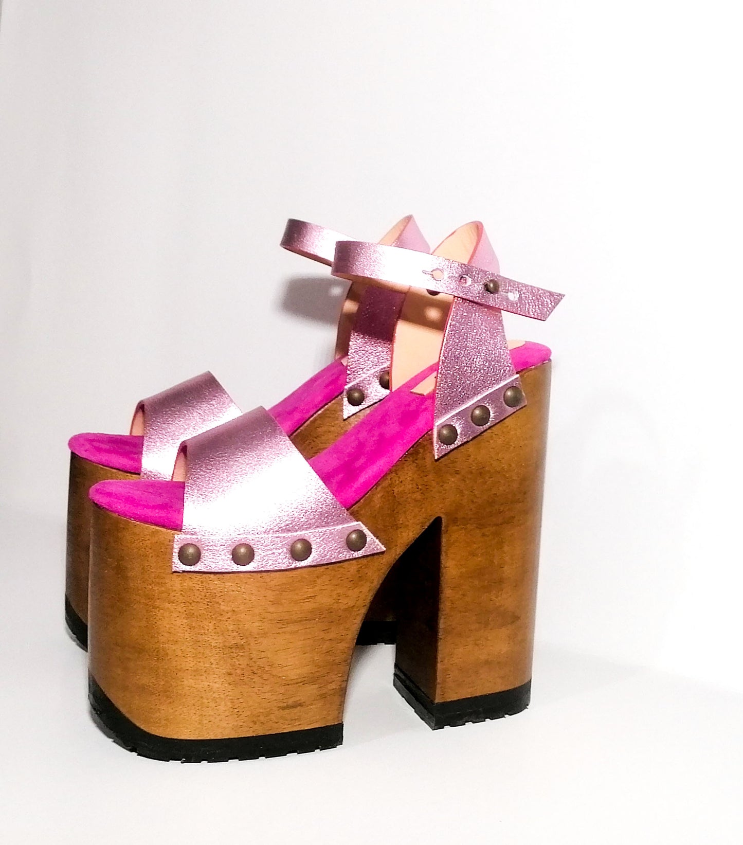 Vintage style platform sandals with super high wooden heels, made in leather. Sizes 34 to 47. Super high wooden heels inspired by the 70s. Exclusive handmade design. High quality footwear handmade by sol Caleyo.
