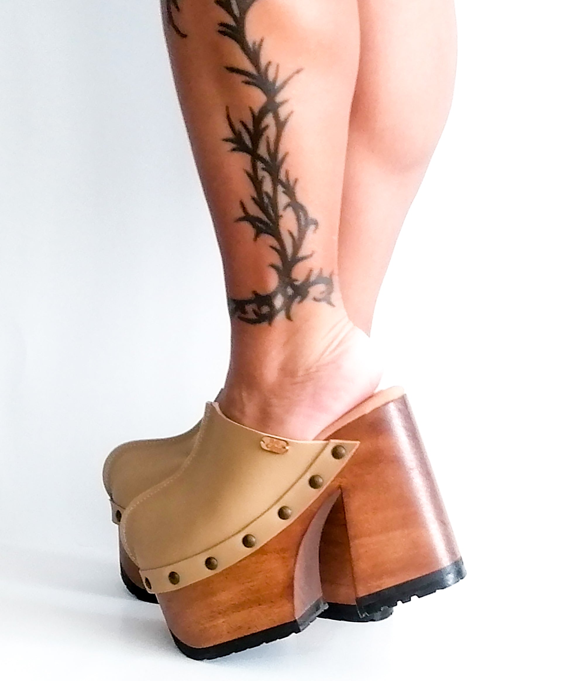 High heeled wooden top clogs