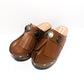 Brown platform clog vintage style 70s. Brown leather clog decorated with American Indian conchos. Leather clogs with wooden heel. Sizes 34 to 47. High quality leather shoes handmade by Sol Caleyo.