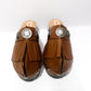 Brown platform clog vintage style 70s. Brown leather clog decorated with American Indian conchos. Leather clogs with wooden heel. Sizes 34 to 47. High quality leather shoes handmade by Sol Caleyo.