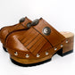 Brown platform clog vintage style 70s. Brown leather clog decorated with American Indian conchos. Leather clogs with wooden heel. Sizes 34 to 47. High quality leather shoes handmade by Sol Caleyo.