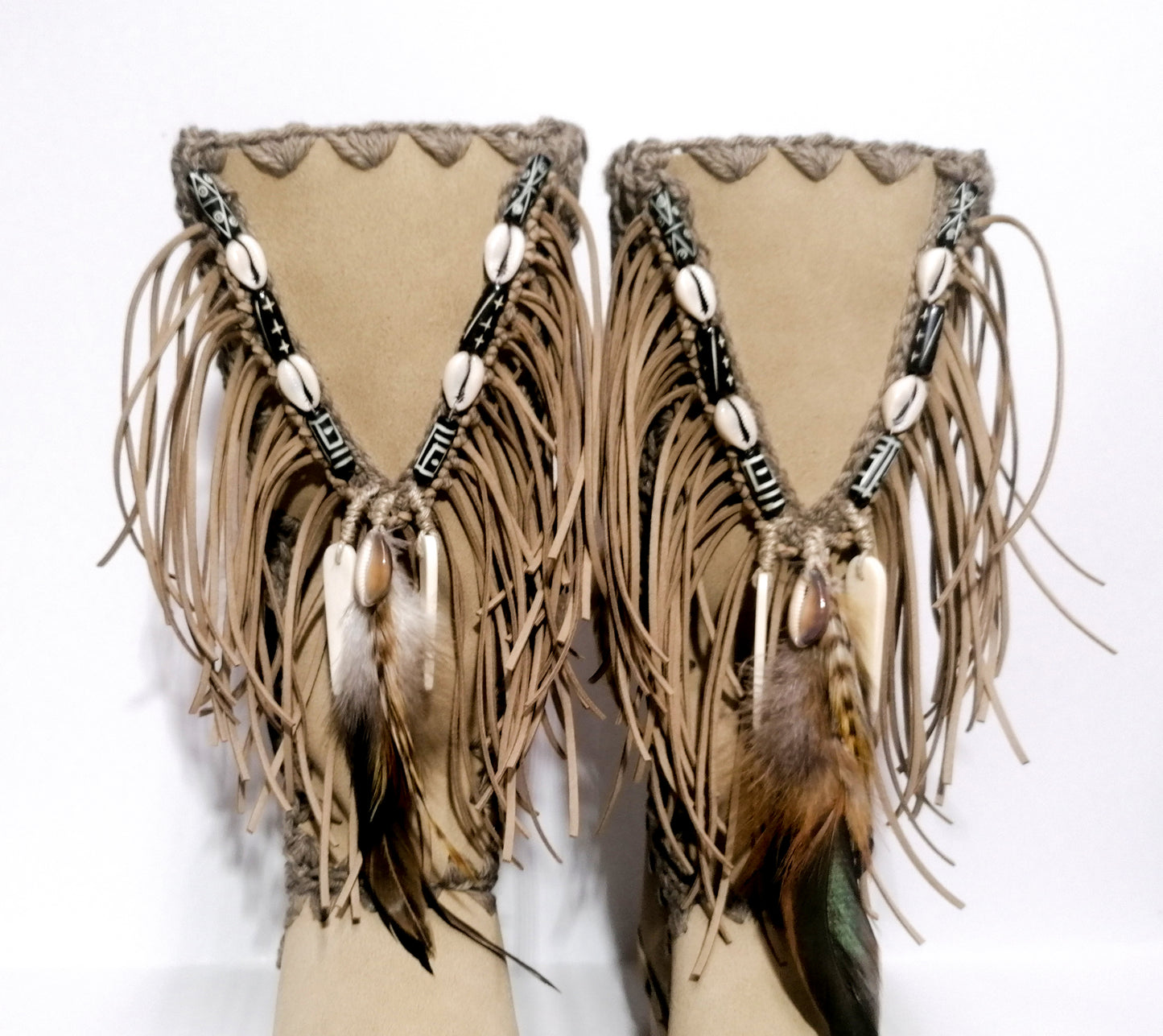 Wooden clog boot. Suede leather boot decorated with fringes, natural shells, feathers, horns and hand painted buffalo. Bohemian style boot with wooden wedge. Sizes 34 to 47. High quality leather footwear handmade by sol Caleyo. Sustainable fashion.